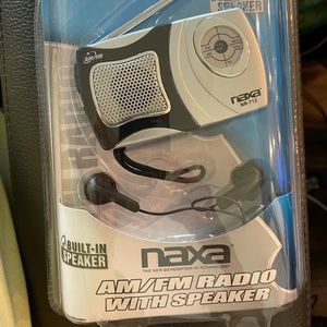 NAXA am/fm radio with speaker  great for stormy conditions. Had stereo earphones